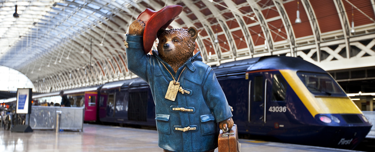 Paddington station with the statue of Paddington Bear and trans