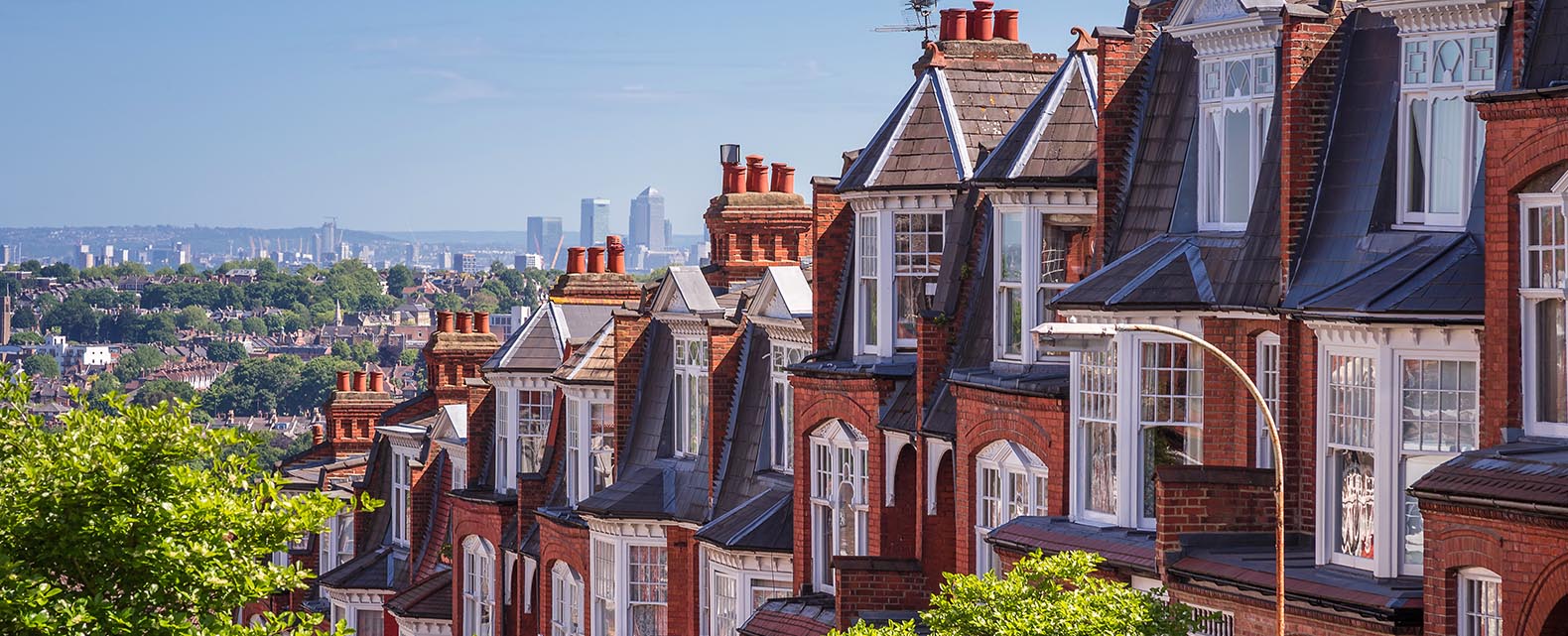London terraced Victorian houses viewed from top of a suburban hill